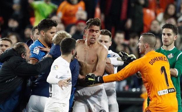 Valencia y Getafe acaban a golpes su eliminatoria