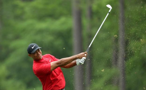 Tiger Woods consigue su quinta chaqueta verde