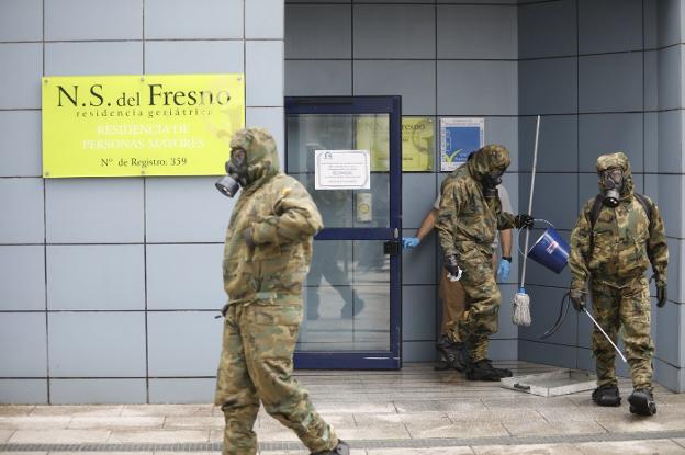 Coronavirus en Asturias | Los 'ángeles' de los sin techo de la Pola