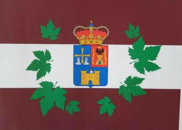 La nueva bandera de Pesoz rinde homenaje al vino