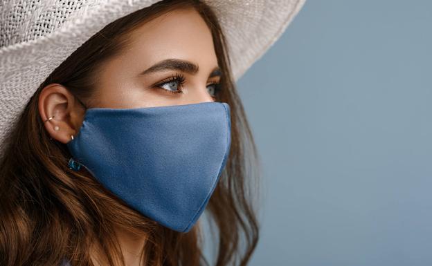Coronavirus | La prohibición de usar mascarillas de tela llega a algunos hospitales de España