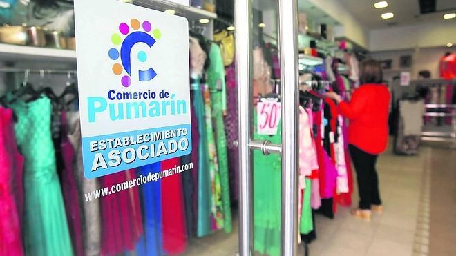 Pumarín crea una marca propia para dinamizar el comercio y el barrio