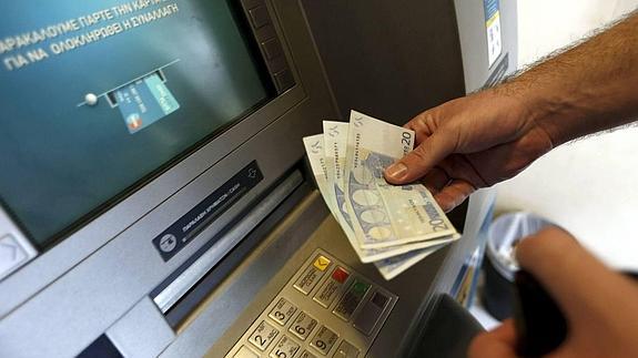 ¿Qué comisión pagaré si saco dinero en otro cajero a partir del 1 de enero?