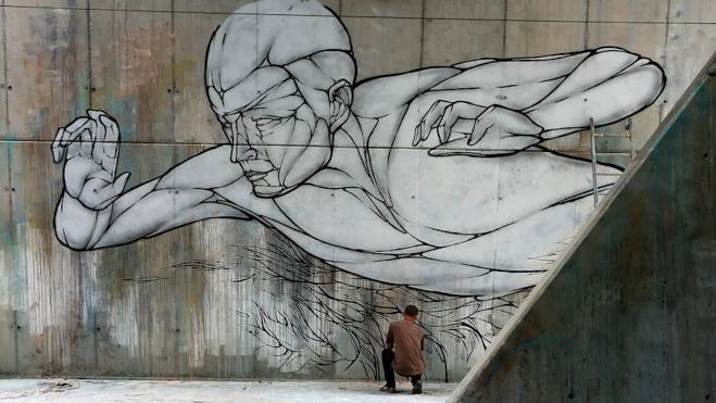 Nava viste de grafitis y murales la plaza de Najosa